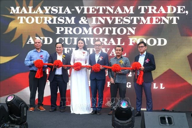 L'événement de promotion de l’investissement, du tourisme et du commerce et du festival gastronomique Malaisie-Vietnam. Photo: VNA