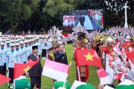 Cérémonie d'accueil du secrétaire général Tô Lâm en Indonésie. Photo: VNA