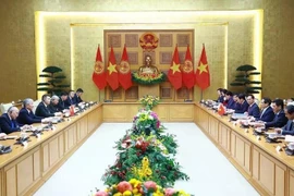 Lors de leur entretien à Hanoï. Photo : VNA