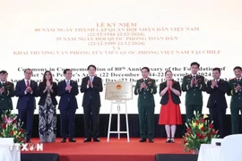 Le président Luong Cuong à la célébration des 80 ans de la fondation de l'Armée populaire vietnamienne au Chili. Photo : VNA